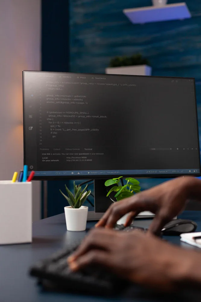 Web & Mobile Development service showcasing coding workspace